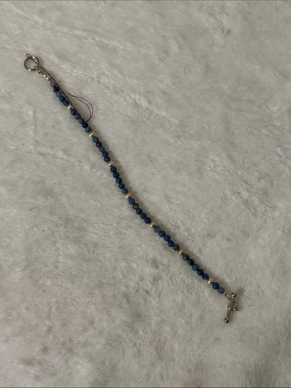 Source Unknown Blue Beaded Bracelet with Cross Charm